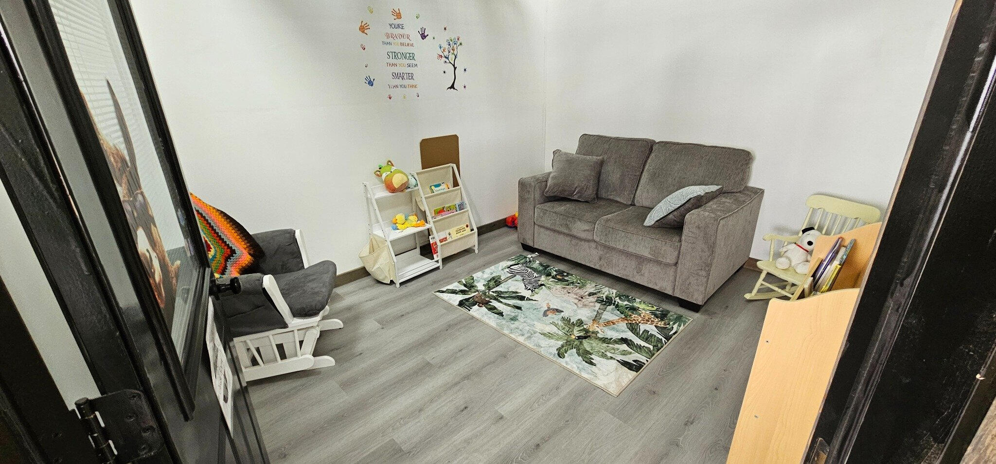 Quiet visitation room with couch and lighting