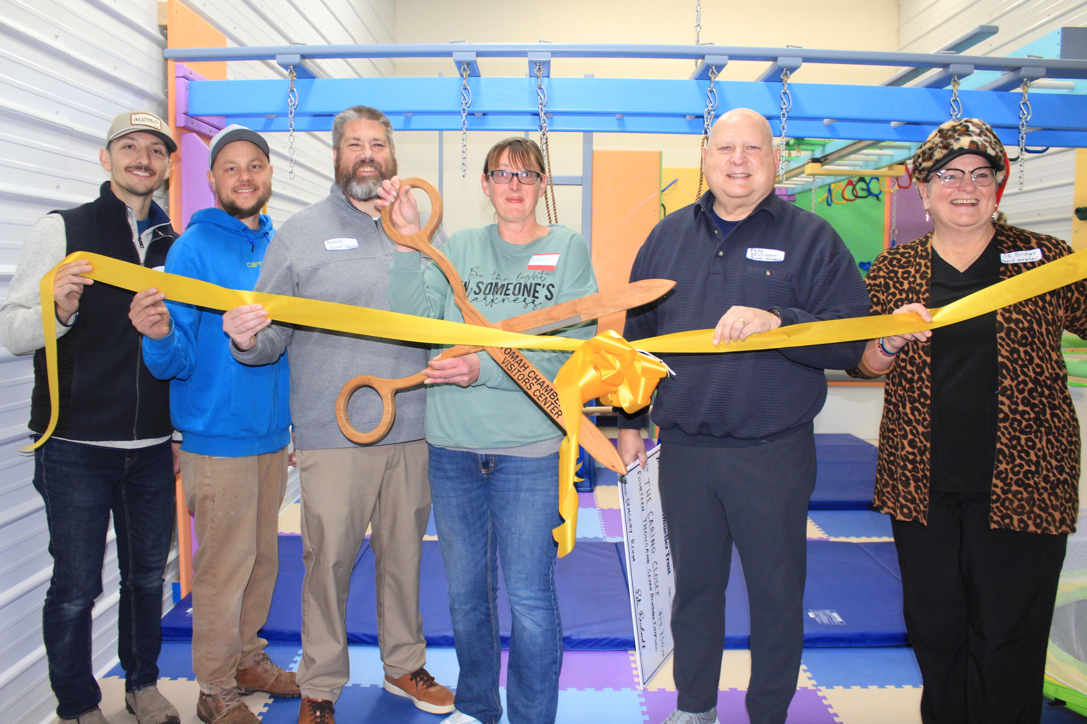 Racks of children’s clothing and winter gear